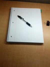 notatnik z długopisem